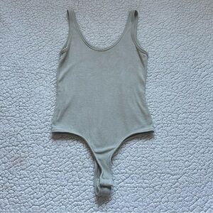 Pale green bodysuit!